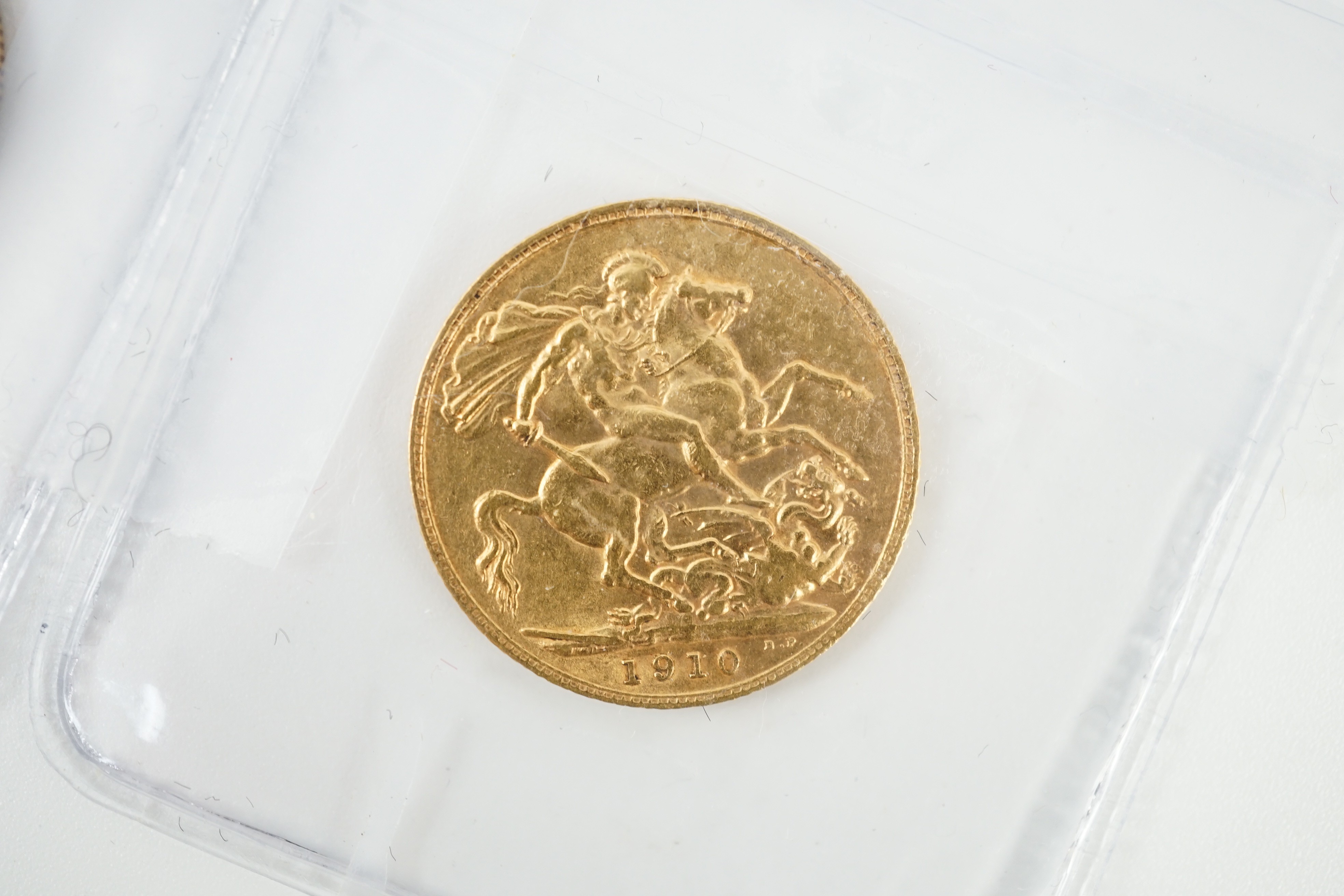 Two gold sovereigns, Victoria 1898M and Edward VII 1910, a George V half sovereign 1913 and a France gold 10 francs 1900 (test mark to portrait).